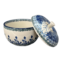 A picture of a Polish Pottery C.A. Large Apple Baker (Waving Tulips) | A034-1825X as shown at PolishPotteryOutlet.com/products/large-apple-baker-waving-tulips-a034-1825x