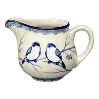 A picture of a Polish Pottery CA 10 oz. Creamer (Bullfinch on Blue) | A341-U4830 as shown at PolishPotteryOutlet.com/products/10-oz-creamer-bullfinch-on-blue-a341-u4830