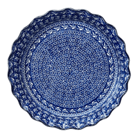 A picture of a Polish Pottery CA 10" Quiche/Pie Dish (Wavy Blues) | A636-905X as shown at PolishPotteryOutlet.com/products/10-quiche-pie-dish-wavy-blues-a636-905x