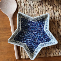 A picture of a Polish Pottery Star-Shaped Baker (Baby Blue Eyes) | M045T-MC19 as shown at PolishPotteryOutlet.com/products/star-shaped-bowl-baker-baby-blue-eyes-m045t-mc19
