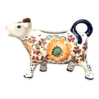 A picture of a Polish Pottery Cow Creamer (Autumn Harvest) | D081S-LB as shown at PolishPotteryOutlet.com/products/cow-creamer-autumn-harvest-d081s-lb