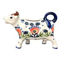A picture of a Polish Pottery Cow Creamer (Floral Fans) | D081S-P314 as shown at PolishPotteryOutlet.com/products/cow-creamer-floral-fans-d081s-p314