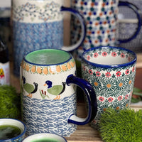A picture of a Polish Pottery Small Tankard (Peacock Dot) | K054U-54K as shown at PolishPotteryOutlet.com/products/bavarian-tankard-peacock-dot-k054u-54k