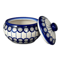 A picture of a Polish Pottery WR Round Covered Container (Peacock in Line) | WR31I-SM1 as shown at PolishPotteryOutlet.com/products/round-covered-container-peacock-in-line-wr31i-sm1