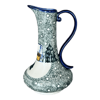 A picture of a Polish Pottery WR 0.8 Liter Lotos Pitcher (Winter Cabin) | WR7E-AB1 as shown at PolishPotteryOutlet.com/products/0-8-liter-lotos-pitcher-winter-cabin-wr7e-ab1