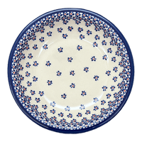 A picture of a Polish Pottery Zaklady Pasta Bowl (Falling Blue Daisies) | Y1002A-A882A as shown at PolishPotteryOutlet.com/products/9-pasta-bowl-falling-blue-daisies-y1002a-a882a