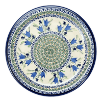A picture of a Polish Pottery Zaklady Dinner Plate 10.75" (Blue Tulips) | Y1014-ART160 as shown at PolishPotteryOutlet.com/products/zaklady-dinner-plate-10-75-blue-tulips-y1014-art160