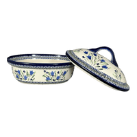 A picture of a Polish Pottery Zaklady 12.5" x 10" Large Covered Baker (Blue Tulips) | Y1158-ART160 as shown at PolishPotteryOutlet.com/products/roasting-pan-w-lid-blue-tulips-y1158-art160