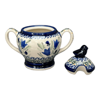 A picture of a Polish Pottery Zaklady Bird Sugar Bowl (Blue Tulips) | Y1234-ART160 as shown at PolishPotteryOutlet.com/products/bird-sugar-bowl-blue-tulips-y1234-art160