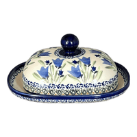 A picture of a Polish Pottery Large Zaklady Butter Dish (Blue Tulips) | Y1394-ART160 as shown at PolishPotteryOutlet.com/products/large-zaklady-butterdish-blue-tulips-y1394-art160