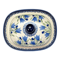 A picture of a Polish Pottery Large Zaklady Butter Dish (Blue Tulips) | Y1394-ART160 as shown at PolishPotteryOutlet.com/products/large-zaklady-butterdish-blue-tulips-y1394-art160