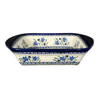 A picture of a Polish Pottery Zaklady 8" x 12" Small Lasagna Baker With Handles (Blue Tulips) | Y1444A-ART160 as shown at PolishPotteryOutlet.com/products/zaklady-lasagna-blue-tulips-y1444a-art160