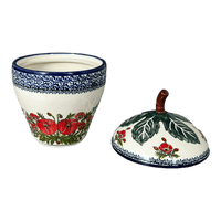 A picture of a Polish Pottery Zaklady Strawberry Canister (Floral Crescent) | Y1873-ART237 as shown at PolishPotteryOutlet.com/products/berry-keeper-fields-of-flowers-y1873-art237