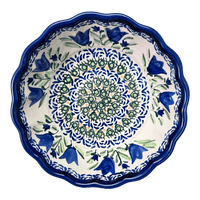 A picture of a Polish Pottery Zaklady Scalloped 6.25" Bowl (Blue Tulips) | Y1891A-ART160 as shown at PolishPotteryOutlet.com/products/zaklady-scalloped-6-25-bowl-blue-tulips-y1891a-art160