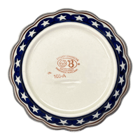 A picture of a Polish Pottery Zaklady Scalloped 6.25" Bowl (Stars & Stripes) | Y1891A-D81 as shown at PolishPotteryOutlet.com/products/zaklady-scalloped-6-25-bowl-stars-stripes-y1891a-d81
