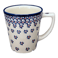 A picture of a Polish Pottery Zaklady 14 oz. Tulip Mug (Falling Blue Daisies) | Y1920-A882A as shown at PolishPotteryOutlet.com/products/14-oz-tulip-mug-falling-blue-daisies-y1920-a882a