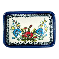 A picture of a Polish Pottery Zaklady Tiny Rectangular Sauce Dish (Floral Crescent) | Y2024-ART237 as shown at PolishPotteryOutlet.com/products/sauce-dish-fields-of-flowers-y2024-art237
