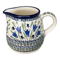 A picture of a Polish Pottery Zaklady 1.2L Pitcher (Blue Tulips) | Y463-ART160 as shown at PolishPotteryOutlet.com/products/1-2l-pitcher-blue-tulips-y463-art160