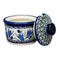 A picture of a Polish Pottery Zaklady 4" Sugar Bowl (Blue Tulips) | Y698-ART160 as shown at PolishPotteryOutlet.com/products/4-sugar-bowl-blue-tulips-y698-art160