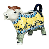A picture of a Polish Pottery Cow Creamer (Sunnyside Up) | D081S-GAJ as shown at PolishPotteryOutlet.com/products/cow-creamer-sunnyside-up-d081s-gaj