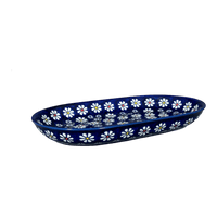 A picture of a Polish Pottery 7"x11" Oval Roaster (Midnight Daisies) | P099S-S002 as shown at PolishPotteryOutlet.com/products/7x11-oval-roaster-midnight-daisies-p099s-s002