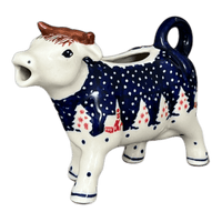 A picture of a Polish Pottery Cow Creamer (Christmas Chapel) | D081T-CHDK as shown at PolishPotteryOutlet.com/products/cow-creamer-christmas-chapel-d081t-chdk