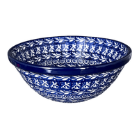 A picture of a Polish Pottery CA 6.75" Kitchen Bowl (Wavy Blues) | A058-905X as shown at PolishPotteryOutlet.com/products/6-75-kitchen-bowl-wavy-blues-a058-905x