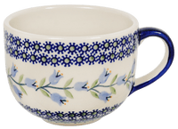 A picture of a Polish Pottery Latte Cup (Lily of the Valley) | F044T-ASD as shown at PolishPotteryOutlet.com/products/large-latte-soup-cups-lily-of-the-valley