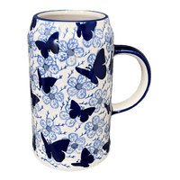 A picture of a Polish Pottery Large Tankard (Blue Butterfly) | K053U-AS58 as shown at PolishPotteryOutlet.com/products/1-25-liter-bavarian-tankard-blue-butterfly-k053u-as58
