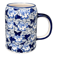 A picture of a Polish Pottery Small Tankard (Dusty Blue Butterflies) | K054U-AS56 as shown at PolishPotteryOutlet.com/products/bavarian-tankard-dusty-blue-butterflies-k054u-as56