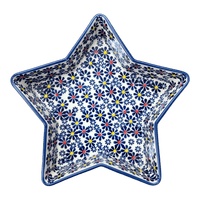 A picture of a Polish Pottery Star-Shaped Baker (Field of Daisies) | M045S-S001 as shown at PolishPotteryOutlet.com/products/star-shaped-bowl-field-of-daisies-m045s-s001