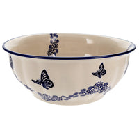 A picture of a Polish Pottery 11" Bowl (Butterfly Garden) | M087T-MOT1 as shown at PolishPotteryOutlet.com/products/11-bowl-butterfly-garden-m087tmot1