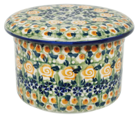 A picture of a Polish Pottery Butter Crock (Perennial Garden) | M136S-LM as shown at PolishPotteryOutlet.com/products/butter-bell-perennial-garden
