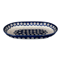 A picture of a Polish Pottery 7"x11" Oval Roaster (Peacock Dot) | P099U-54K as shown at PolishPotteryOutlet.com/products/7x11-oval-roaster-peacock-dot-p099u-54k