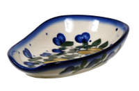 A picture of a Polish Pottery WR 3.5" x 5" Spoon Rest (Pansy Wreath) | WR55D-EZ2 as shown at PolishPotteryOutlet.com/products/spoon-rest-ez2