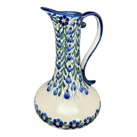 A picture of a Polish Pottery WR 0.8 Liter Lotos Pitcher (Modern Blue Cascade) | WR7E-GP1 as shown at PolishPotteryOutlet.com/products/0-8-liter-lotos-pitcher-modern-blue-cascade-wr7e-gp1