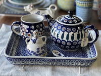 A picture of a Polish Pottery Little Lemon Lady (Blue Canopy) | B002U-IS04 as shown at PolishPotteryOutlet.com/products/little-lemon-lady-blue-canopy-b002u-is04