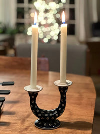 A picture of a Polish Pottery Two-Armed Candle Holder (Carnival) | S134U-RWS as shown at PolishPotteryOutlet.com/products/two-armed-candle-holder-carnival-s134u-rws