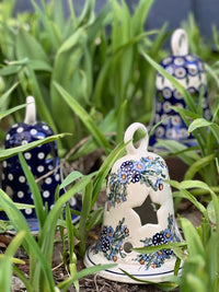 A picture of a Polish Pottery Large Bell Luminary (Meadow in Bloom) | NDA138-A54 as shown at PolishPotteryOutlet.com/products/large-bell-luminary-meadow-in-bloom-nda138-a54