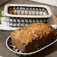 A picture of a Polish Pottery Bread Baker (Cherry Dot) | Z150T-70WI as shown at PolishPotteryOutlet.com/products/9-5-x-6-bread-baker-cherry-dot-z150t-70wi
