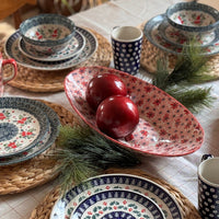 A picture of a Polish Pottery Large Oblong Serving Bowl (Duet in Black & Red) | M168S-DPCC as shown at PolishPotteryOutlet.com/products/large-oblong-serving-bowl-duet-in-black-red-m168s-dpcc