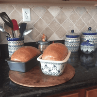 A picture of a Polish Pottery Baker, Bread, 9.5" x 6" in "Blue Life" by Manufaktura | Z150S-EO39 as shown at PolishPotteryOutlet.com/products/bread-baker-blue-life-z150s-eo39