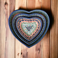 A picture of a Polish Pottery 6.5" x 7" Heart Bowl  (Blue Lattice) | NDA367-6 as shown at PolishPotteryOutlet.com/products/6-5-x-7-heart-bowl-blue-lattice-nda367-6