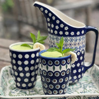 A picture of a Polish Pottery Large Tumbler (Hello Dotty) | NDA11-A64 as shown at PolishPotteryOutlet.com/products/large-tumbler-hello-dotty-nda11-64