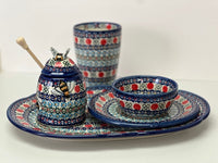 A picture of a Polish Pottery Jar, Honey, 5" in "Pom-Pom Flower" by Andy | NDA18-30 as shown at PolishPotteryOutlet.com/products/honey-jar-pom-pom-flower-nda18-30