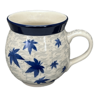 A picture of a Polish Pottery Mug, Belly, 12 oz Medium in "Blue Sweetgum" by Ceramika Artystyczna | A070-2545X as shown at PolishPotteryOutlet.com/products/c-a-12-oz-belly-mug-blue-sweetgum-a070-2545x