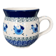 Decorative mug with blue rooster design on a white background