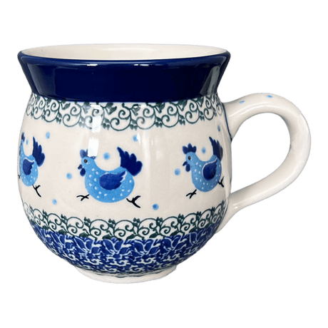 Decorative mug with blue rooster design on a white background