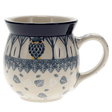 Ceramic mug with owl design on a white background