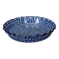 A picture of a Polish Pottery CA 10" Quiche/Pie Dish (Wavy Blues) | A636-905X as shown at PolishPotteryOutlet.com/products/10-quiche-pie-dish-wavy-blues-a636-905x
